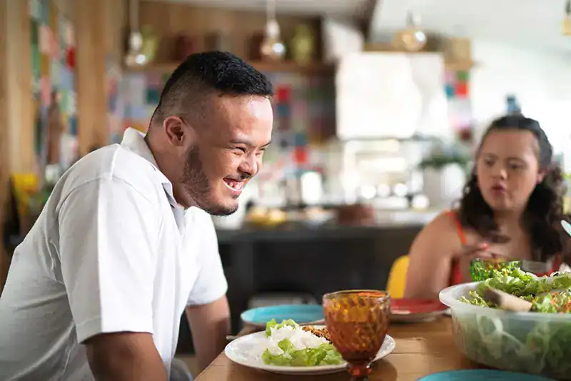 Empowering Weight Loss: A Comprehensive Guide for Individuals with Disabilities 2 Image of a disabled man and balance around nutrition to aid weight loss Dorchester
